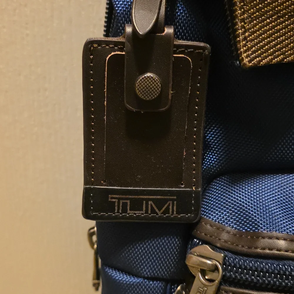 Tumi Navy and Brown Roll-Top Backpack